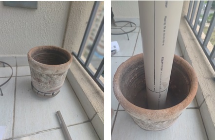 Apoie o cano de PVC verticalmente dentro do vaso e marque no cano o nível da terra até a altura que o vaso será preenchido.